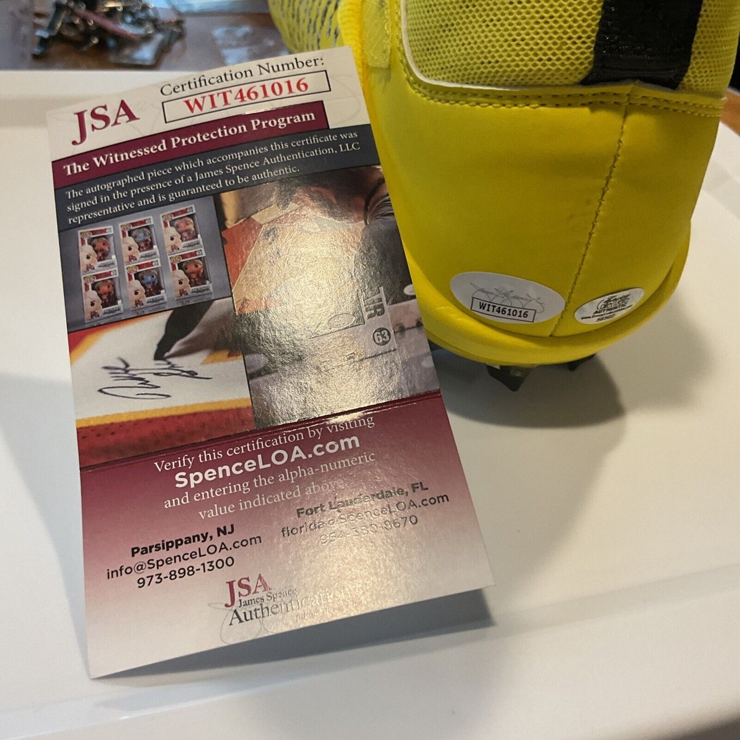 Autographed cleats by HOF Daunte Culpper