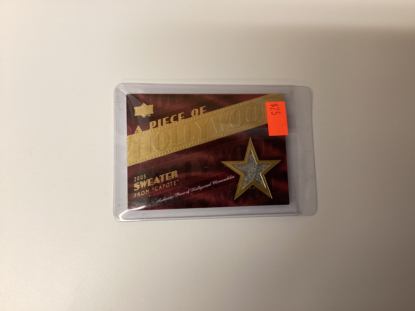 Upper deck, a piece of Hollywood 2005 sweater from Capote card