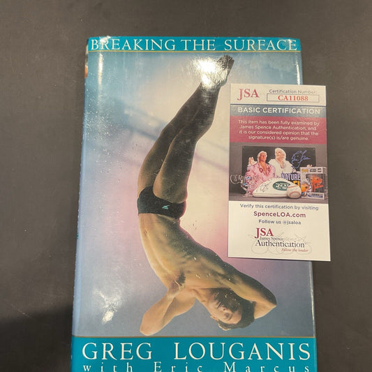 “Breaking the surface” Novel autographed Greg Louganis JSA coa 